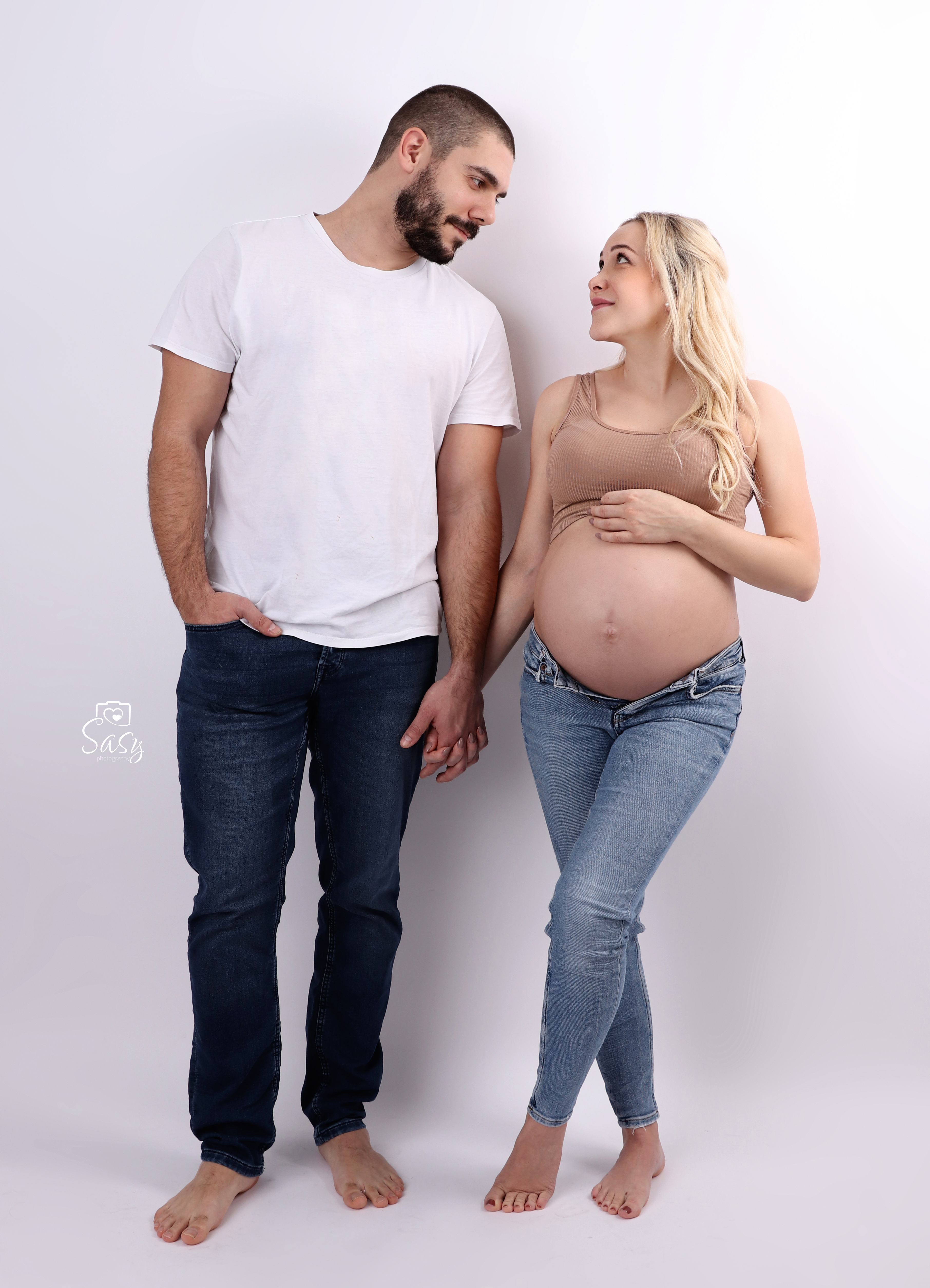 Mann und Frau, bald zu dritt - bei Sasy Photography
